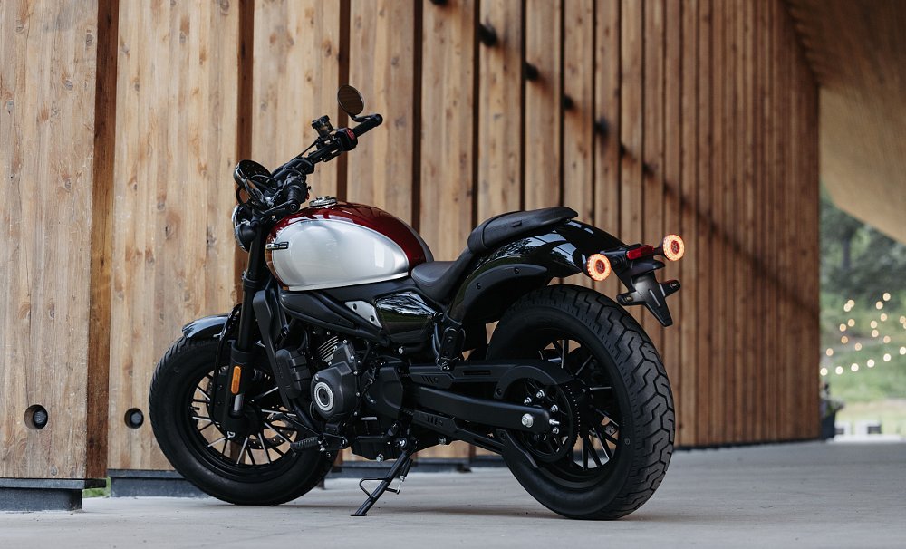 red and white CFMOTO 450CL-C in a garage