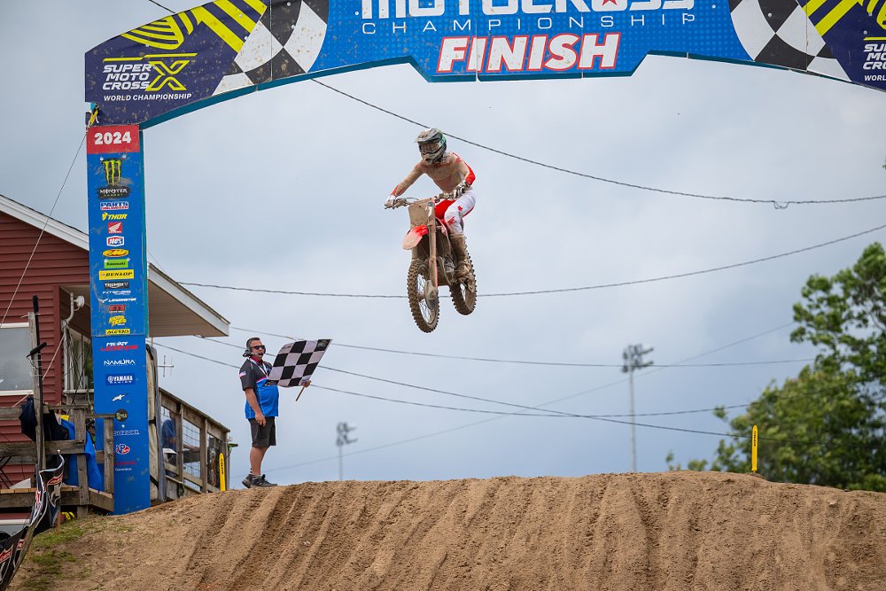 Lawrence flying high over a jump in a motocross race at Southwick, MA