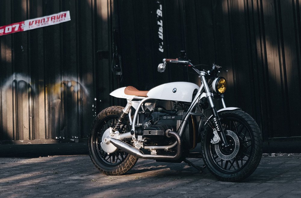 white, minimalist custom BMW motorcycle