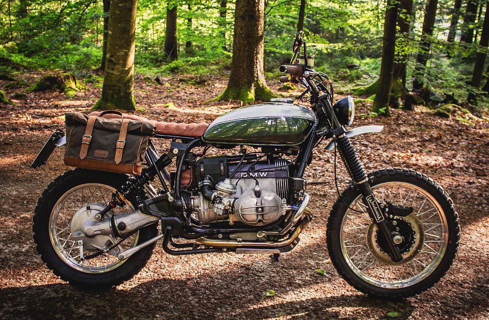 custom BMW in a shady wooded area
