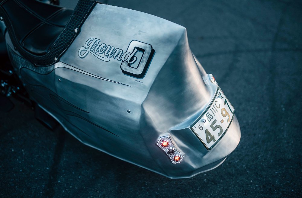 view of small taillights in aluminum bodywork