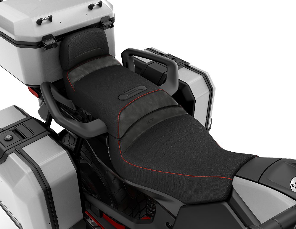 photo of broad passenger seat with hand grab rails