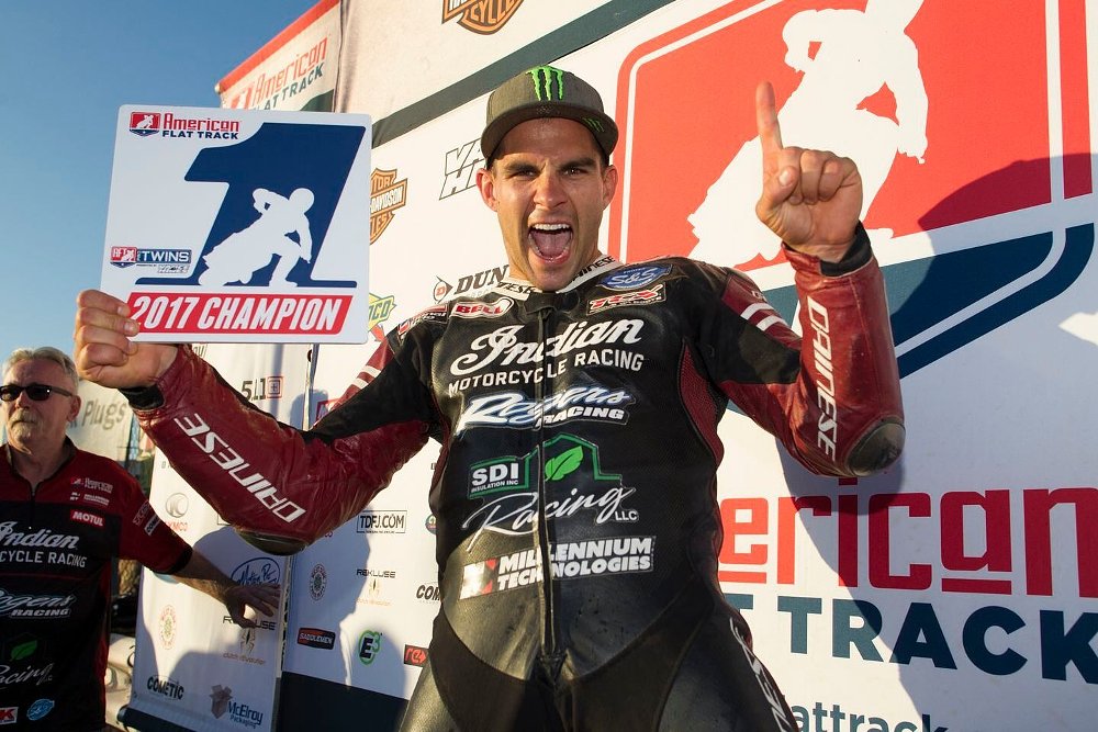 Mees holding the 2017 number one plate and cheering