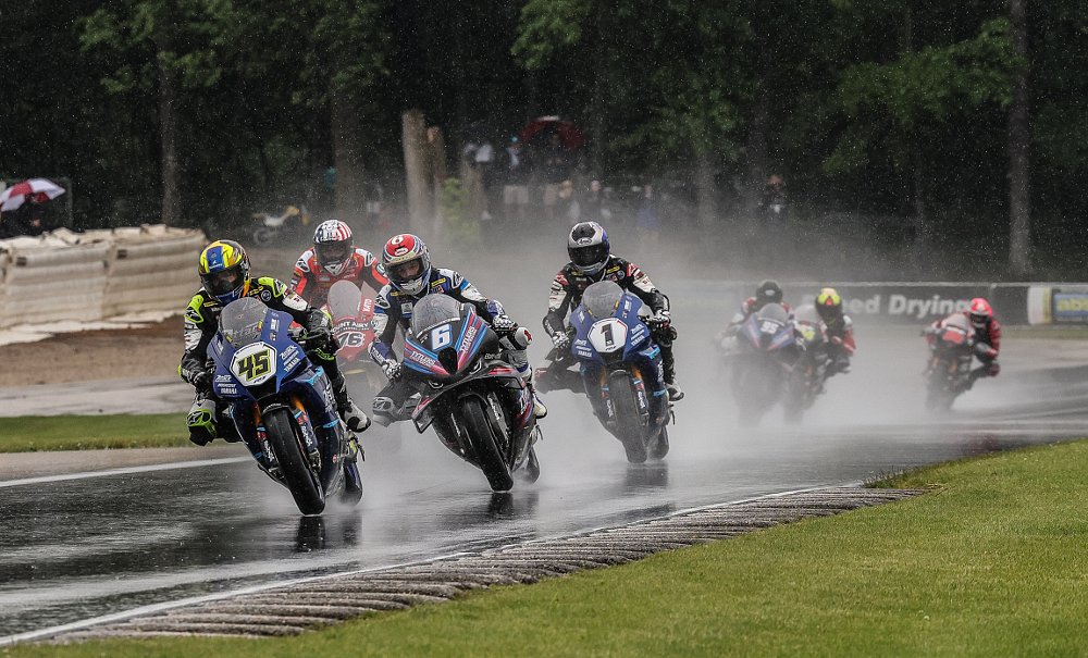 Petersen, Beaubier, and Gagne racing in the rain at Road America