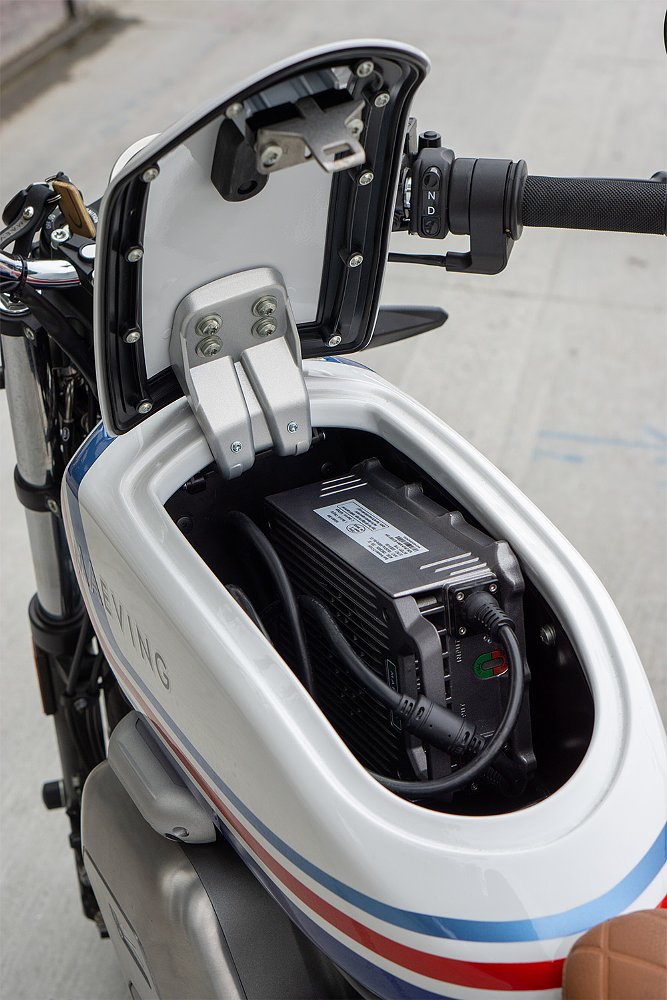 photo of faux fuel tank holding the charger for the motorcycle