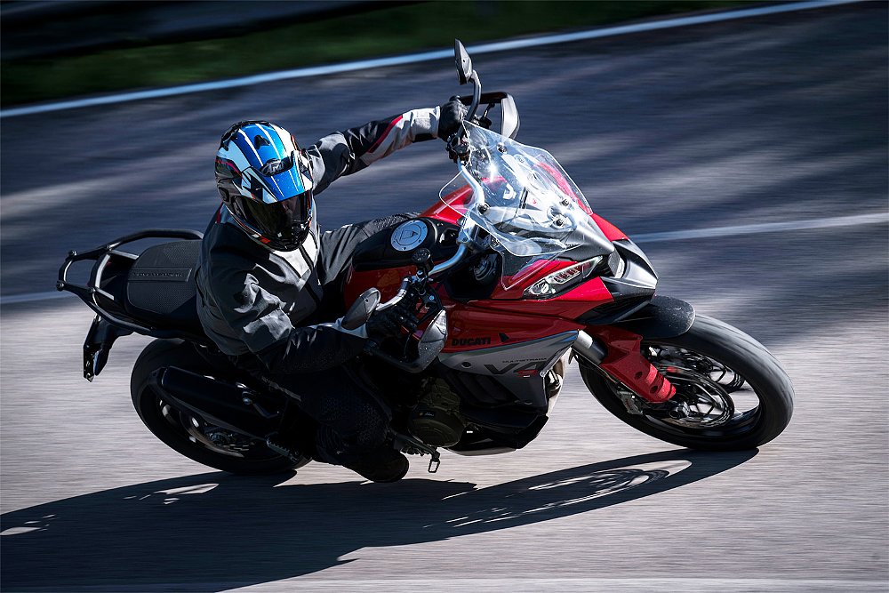 Dustin bends the Multistrada V4 S around a banked hairpin. 