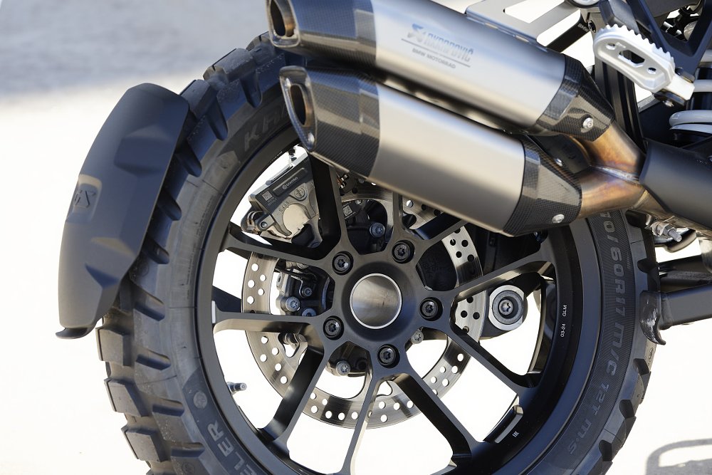 close view of the rear wheel and exhaust