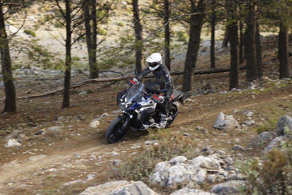 overhead view of the GS Adventure being ridden on a single-track trail