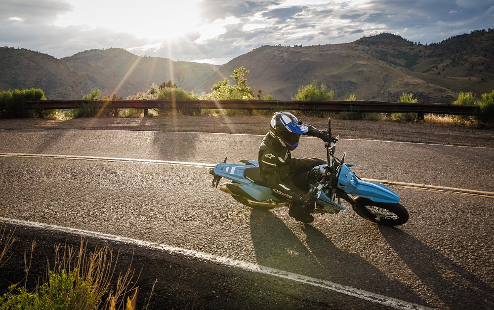 rider on a DR-Z4SM on a winding road