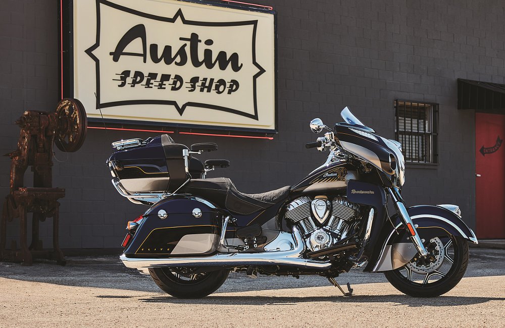 Roadmaster Elite parked in front of a 'Austin Speed Shop' sign