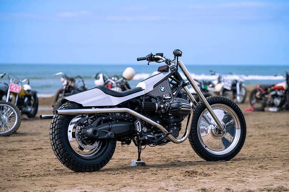 silver sand drag race motorcycle parked on the beach