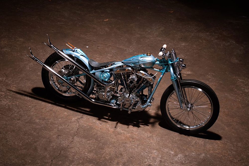 long low blue chopper motorcycle