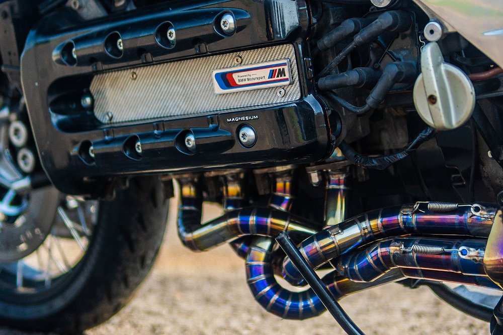 close view of the inline-four-cylinder engine with custom exhaust