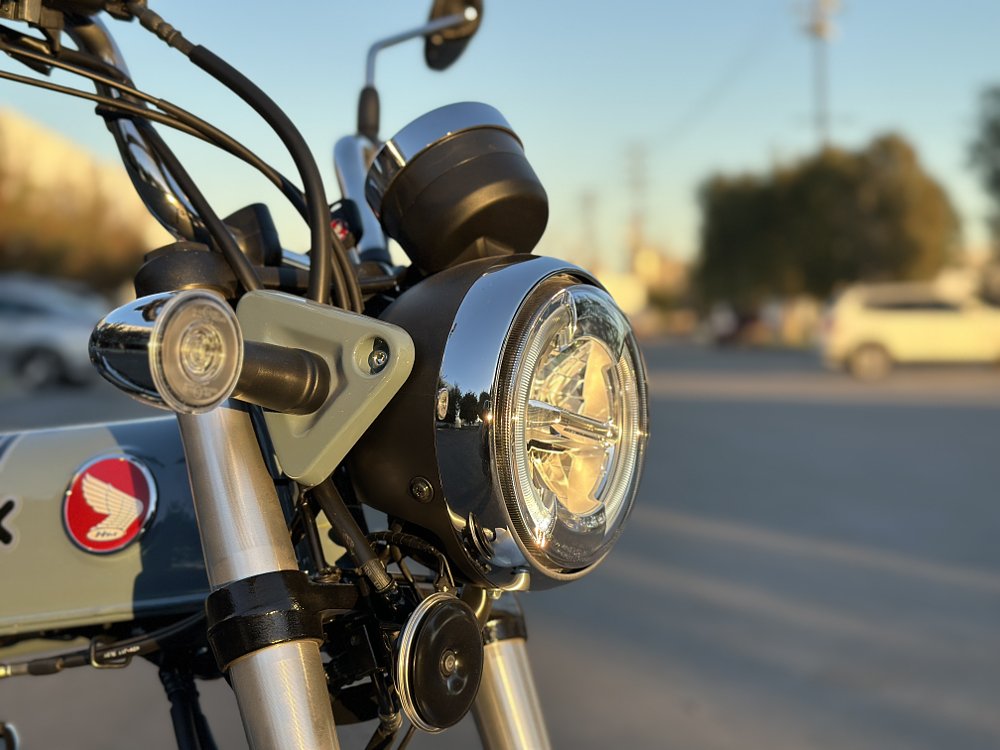 Headlight detail image of a 2025 Honda Dax 125.