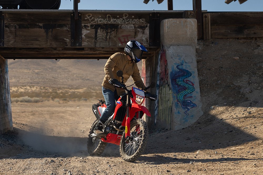 Dustin slides Ari's CRF300L around a turn.