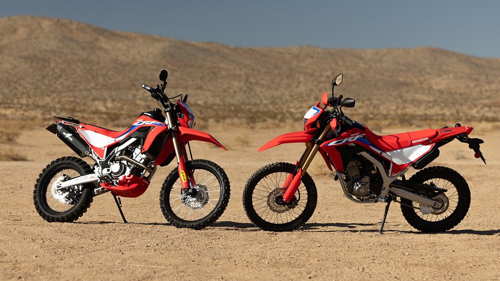 A stock 2024 Honda CRF300L and a heavily modded 2021 Honda CRF300L staged in the California desert.