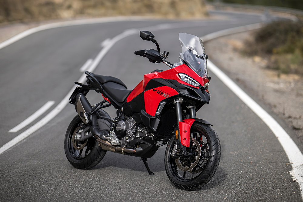 The 2025 Ducati Multistrada V2 S staged on a twisty mountain road.