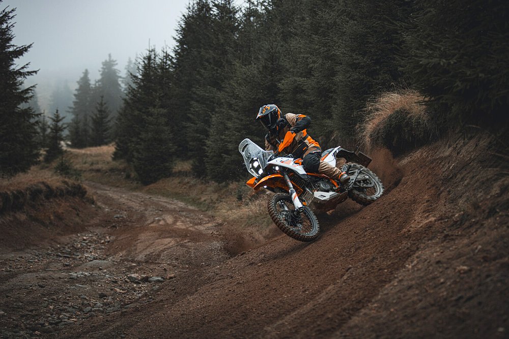 A 390 Adventure R rider sliding the bike around a berm.