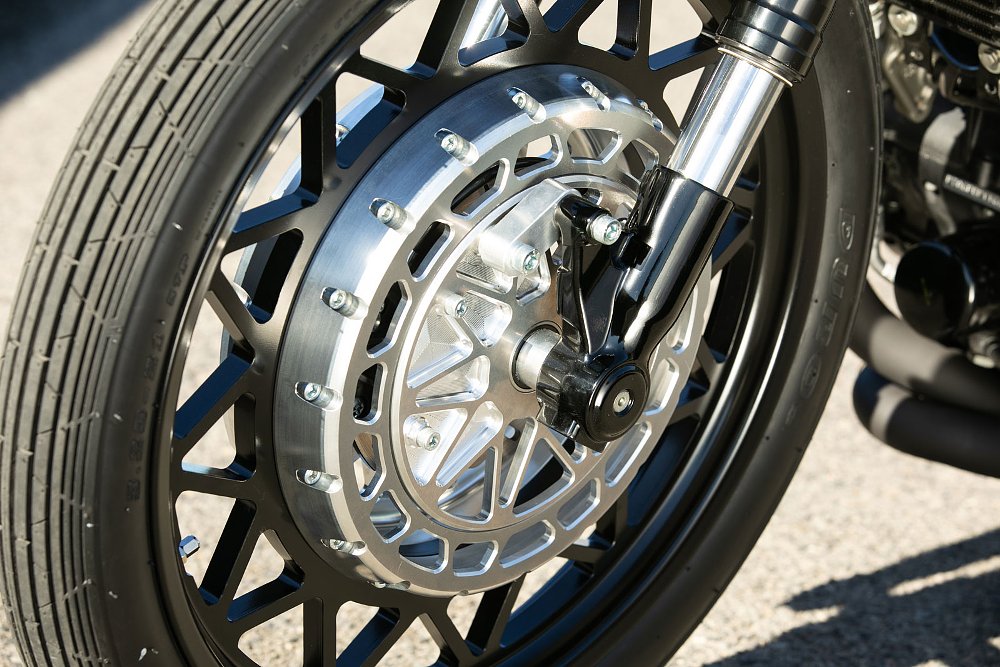 close view of the front wheel with the unusual brake
