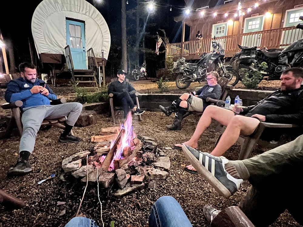 Tobias, Kirk, Mani, Jocelin, and me sitting around the campfire at Welcome Valley Village.