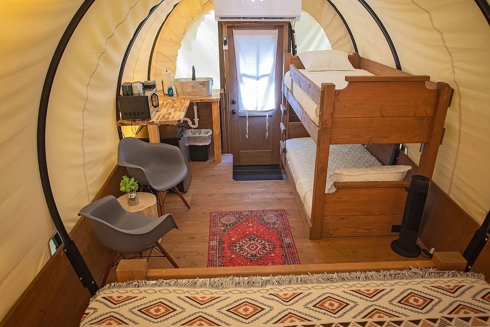 An interior view of a Conestoga wagon at the Welcome Valley Village campground.