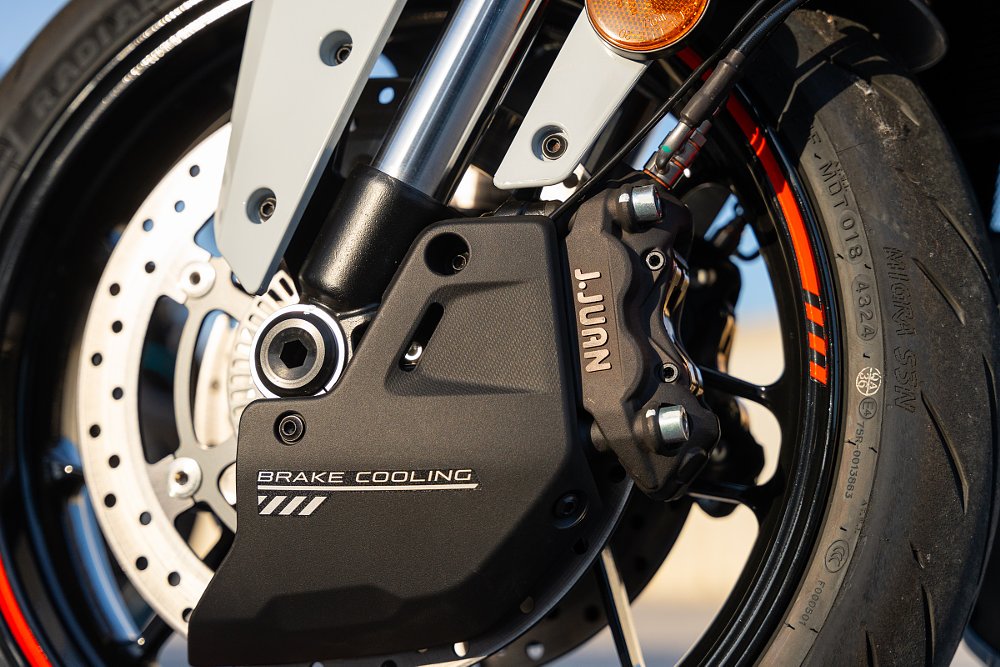 close view of the J.Juan front brakes and the black cooling duct that funnels air onto the disc