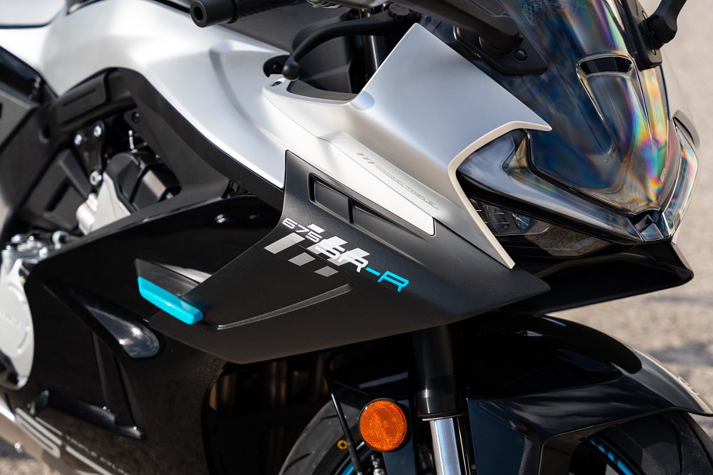 close view of the aerodynamic wings on the side of the fairing