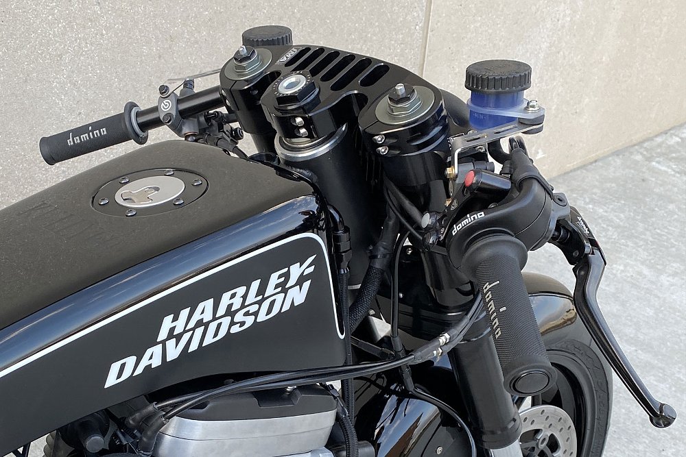 close view of the cockpit with low clip-ons and the fuel tank