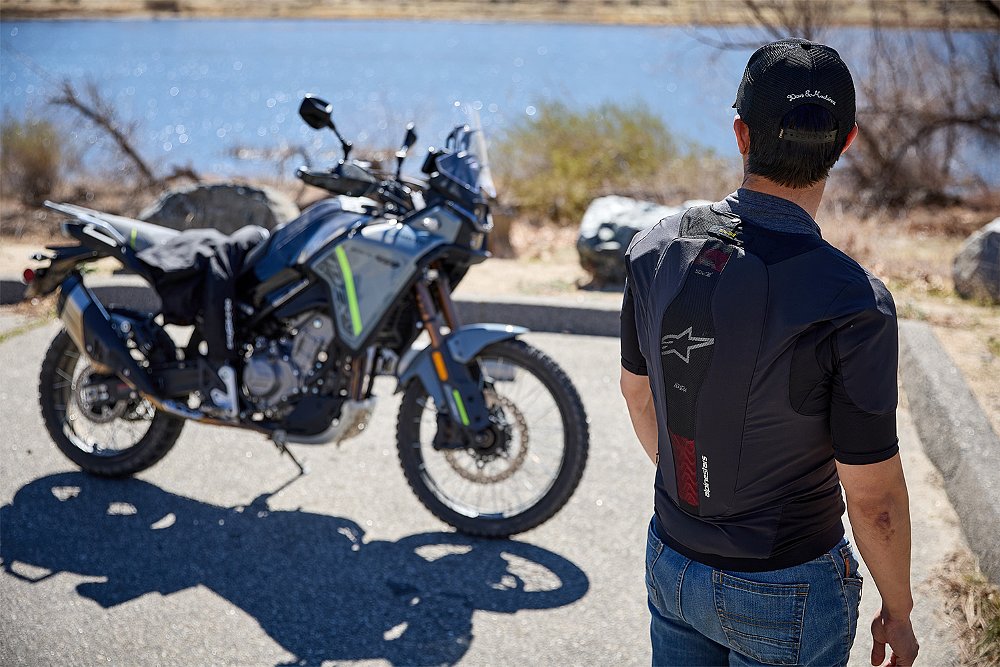 A shot of Dustin's back as he wears the Alpinestars Tech-Air 5 Plasma.