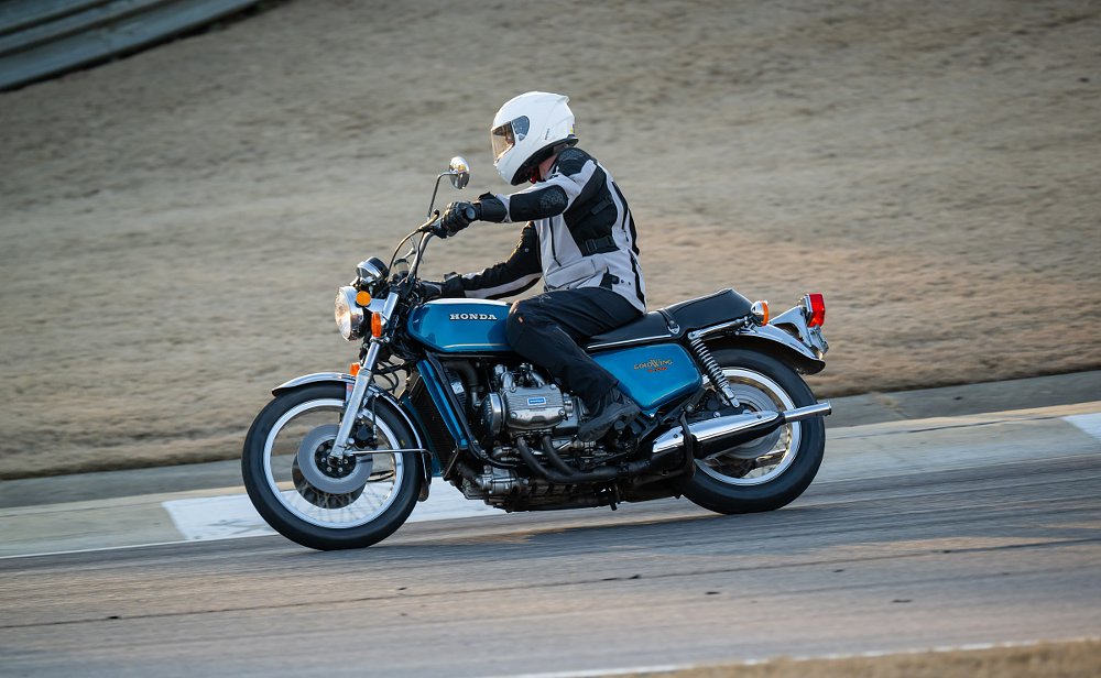 riding a blue 1975 Gold Wing on the track at Barber Motorsports Park