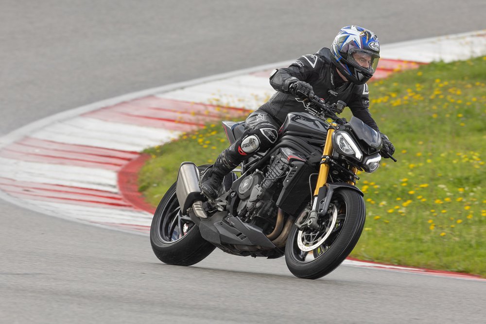 riding the Speed Triple on a wet race track