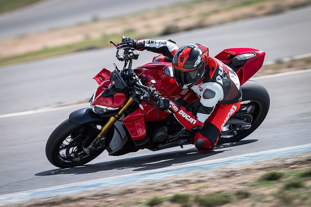 Dustin riding the Streetfighter V4 S through a sweeping turn.