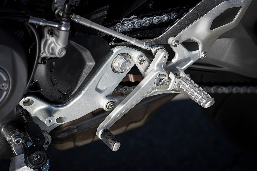 A close-up of the Streetfighter V2's left footpeg and shift lever.