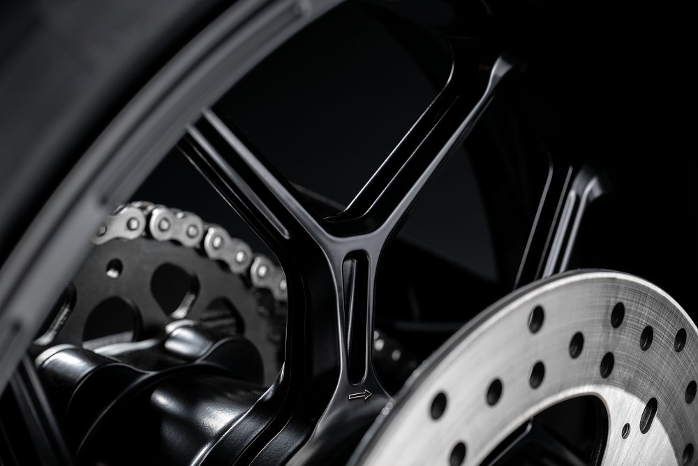 A close-up shot of the Ducati Panigale V4 Lamborghini's Revuelto-inspired forged aluminum wheel.