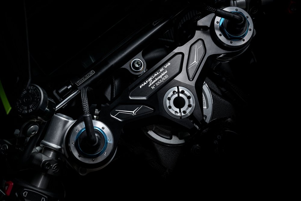 A close up of the Ducati Panigale V4 Lamborghini's top clamp.