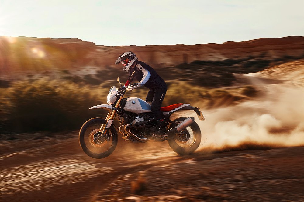 An A.I.-generated image of an R 12 G/S rider plowing through a dusty trail.
