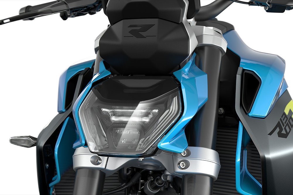 A close-up shot of the BMW R 1300 R's headlight cluster.