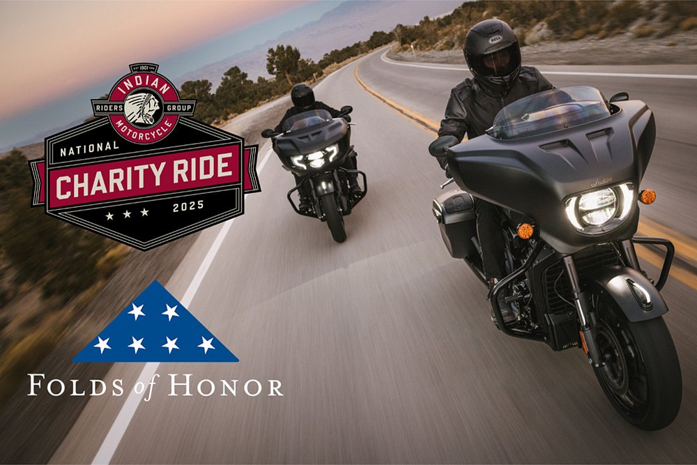 Two Indian bagger riders cruise down a backroad.