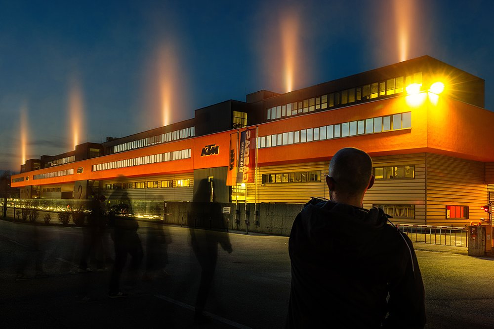 photo of KTM building lit up at night