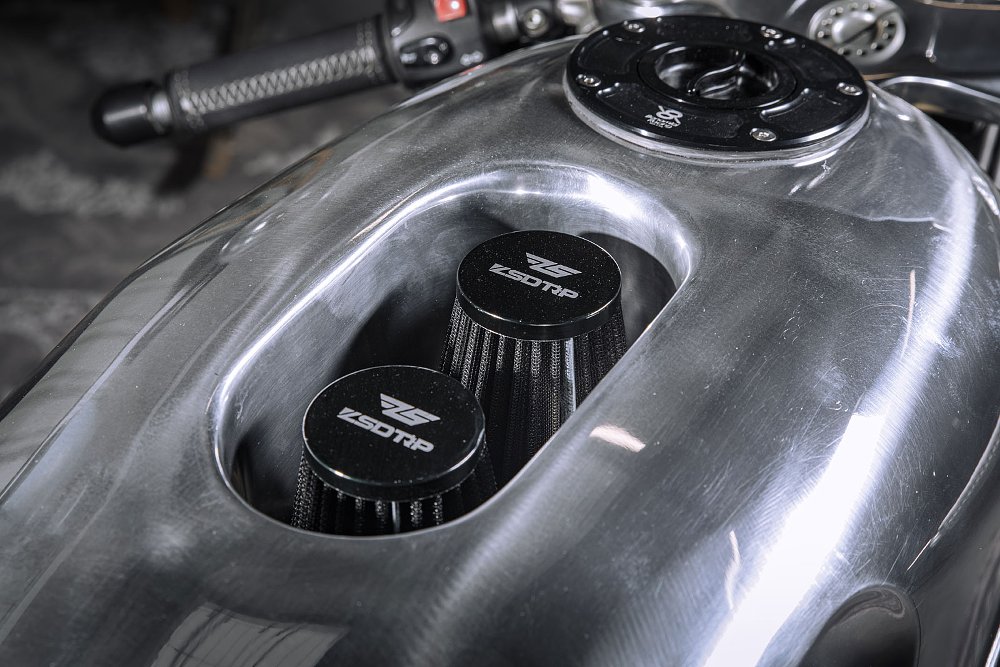 close view of air pods protruding from the fuel tank