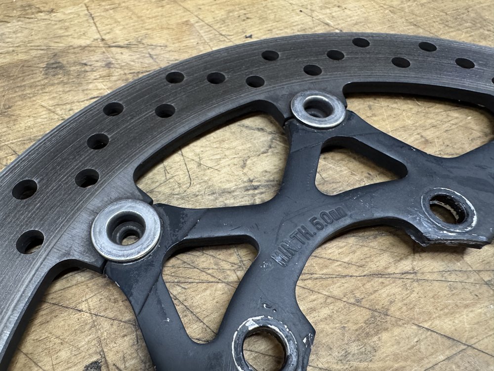 Inspecting brake disc condition and thickness 