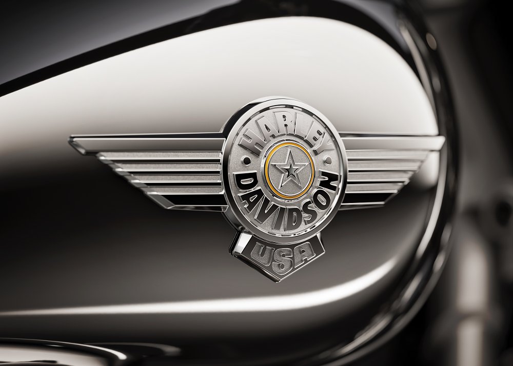 A close-up of the 2025 Harley-Davidson Fat Boy Gray Ghost's chrome-like gas tank.