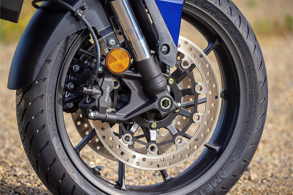 A close-up of the NT-1100's front braking system.