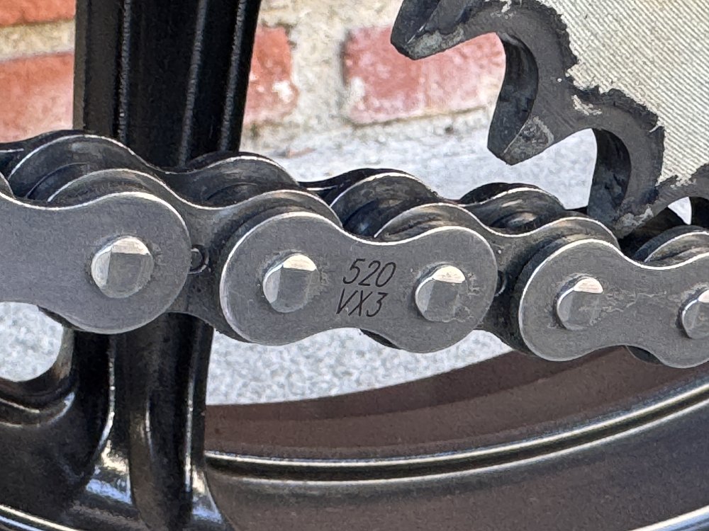 Motorcycle chains size printed on chain link