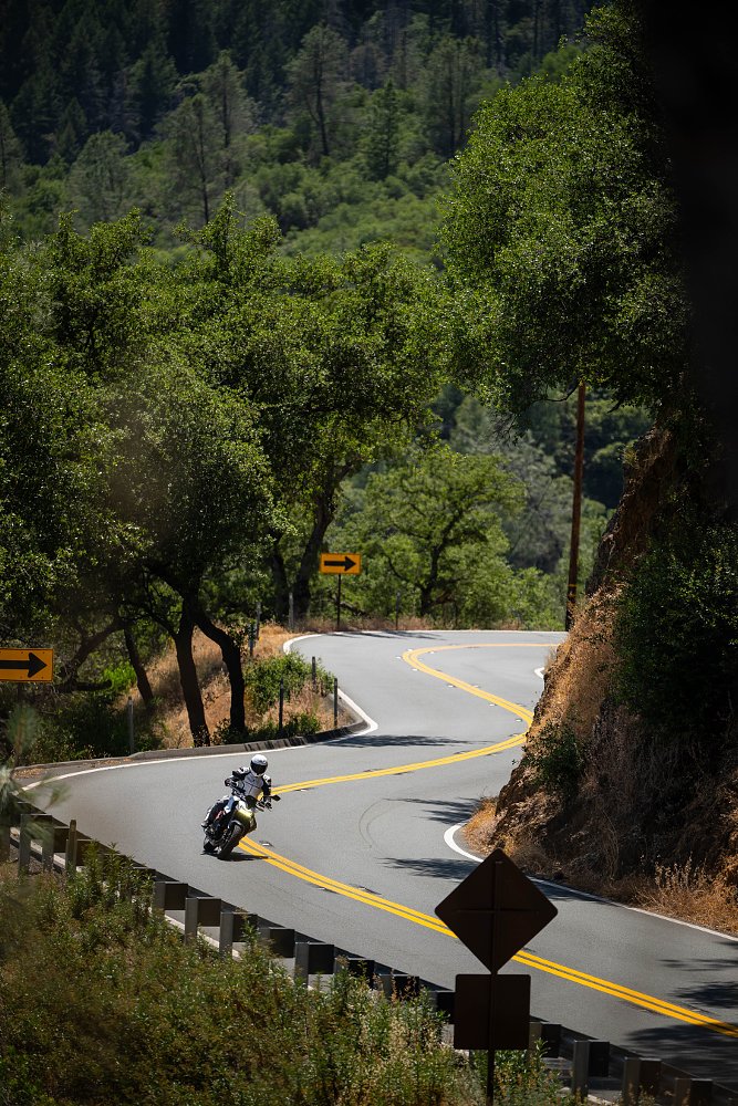 distant view of a rider on the CB750 Hornet on a country road