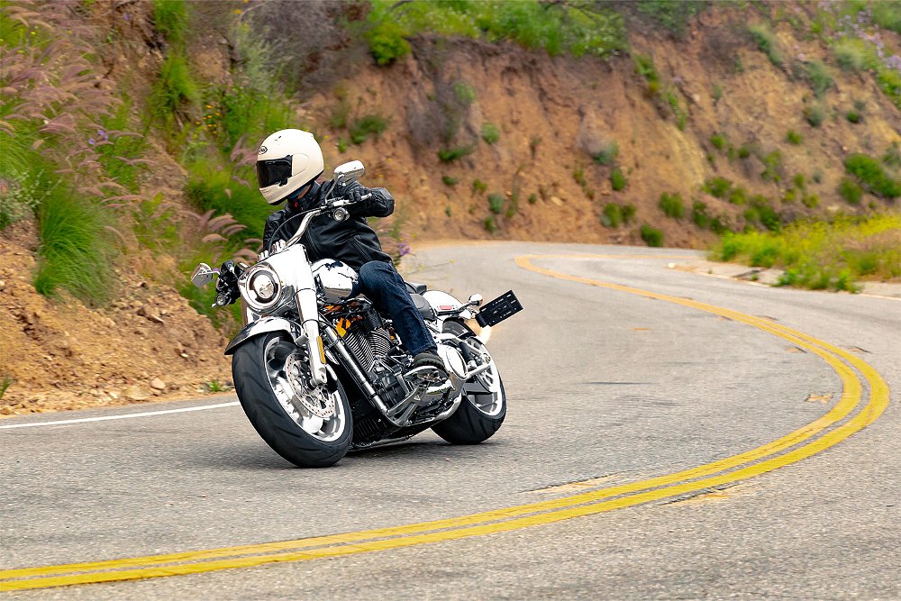 Dustin guides the 2025 Fat Boy Gray Ghost through a curvy canyon road.