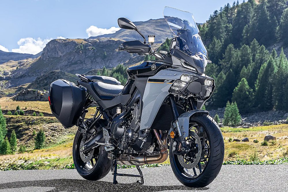 The 2025 Yamaha Tracer 9 pictured against a mountain.