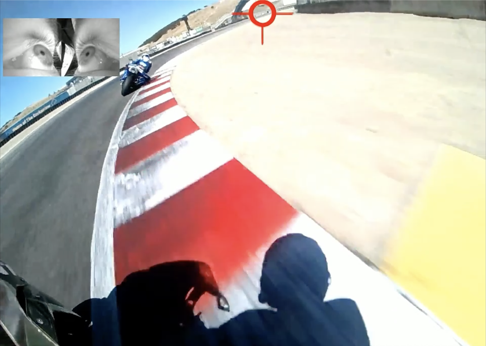 Image from video footage that shows where a motorcycle rider is looking while riding around a race track.