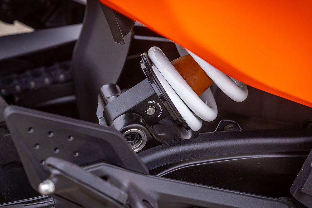 A close-up of the SMC R's split-piston WP Apex monoshock.