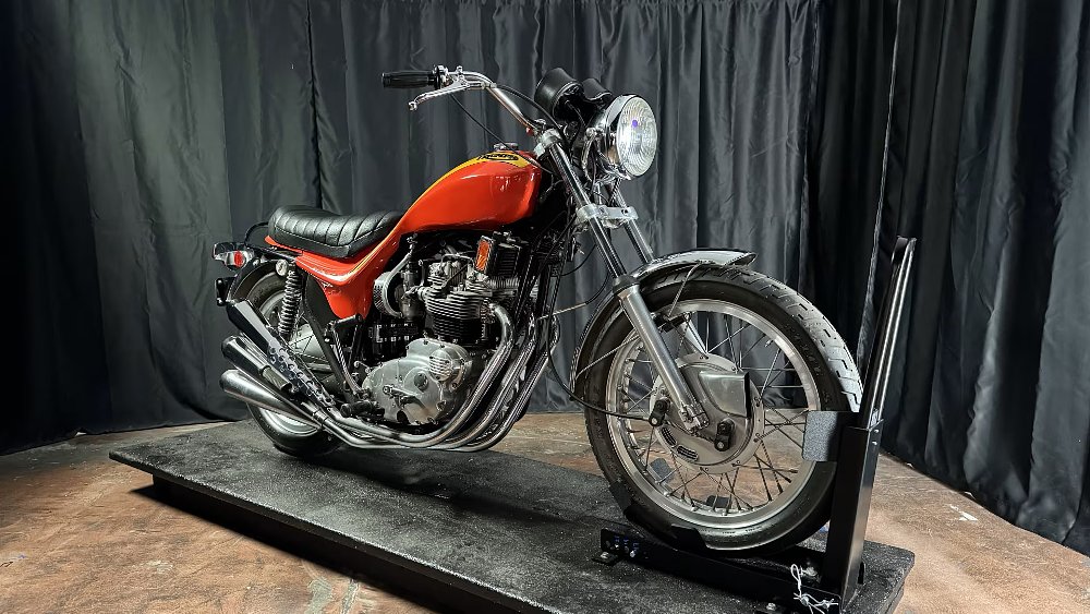 front angle view of the orange Hurricane with the three-cylinder engine